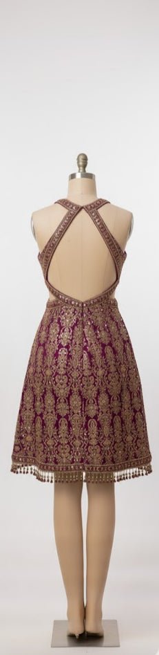 Indo - Western Halter Neck Dress - "A stunning fusion of intricate Indian artistry and a bold, modern halter silhouette." - The MadhuIndo - Western Halter Neck Dress - "A stunning fusion of intricate Indian artistry and a bold, modern halter silhouette."
