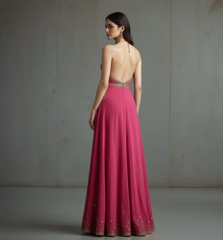 The Rebel Rose - Define your day with The Rebel Rose, a daring rose - pink designer gown featuring bold gold embroidery and a modern high slit. - The MadhuThe Rebel Rose - Define your day with The Rebel Rose, a daring rose - pink designer gown featuring bold gold embroidery and a modern high slit.